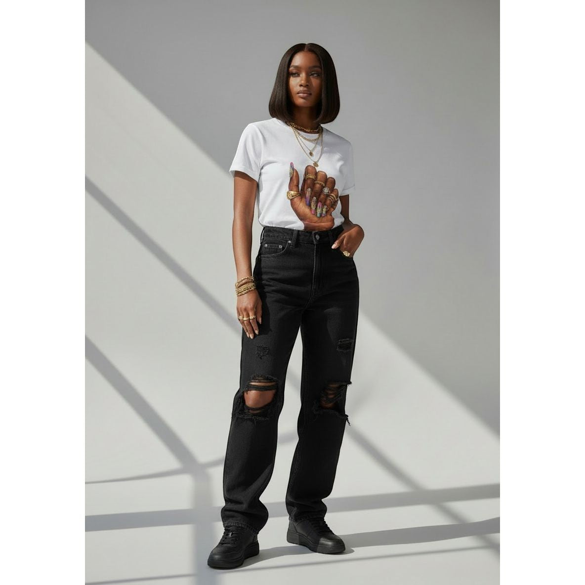 Sweet Plus Savage white cotton t-shirt with a graphic print of a hand adorned with rings and colorful nails.